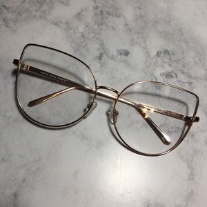 Oversized gold glasses